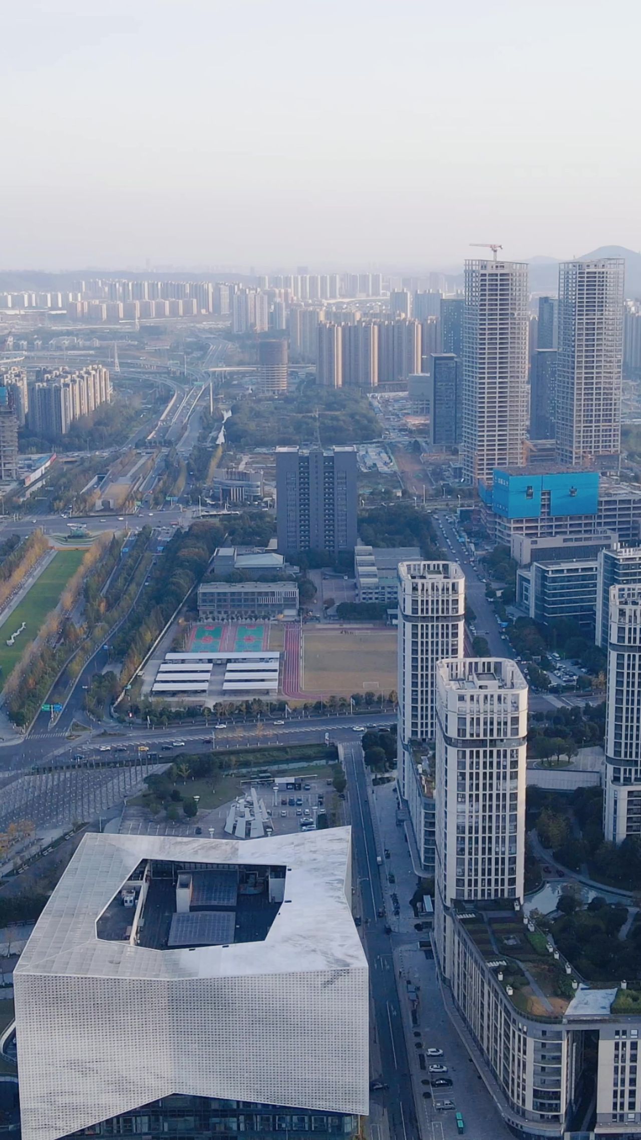 城市航拍南京城市高楼建设竖屏