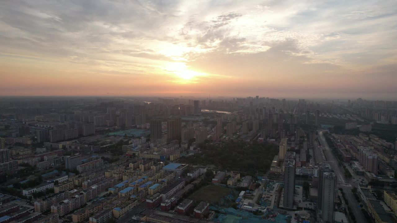 城市清晨日出彩霞航拍山东聊城  
