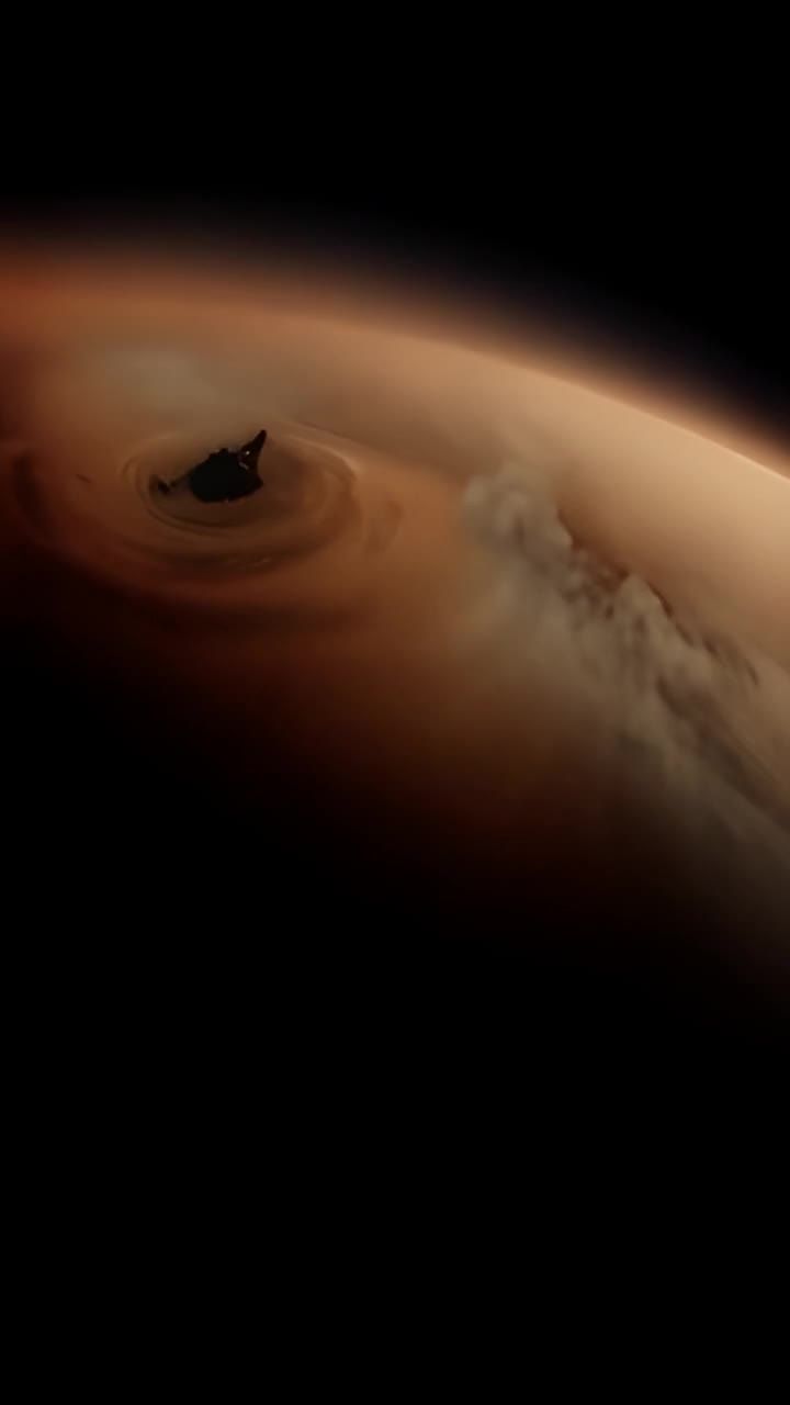 图像显示一个深色的空间背景，上方有稀疏的星点。水平