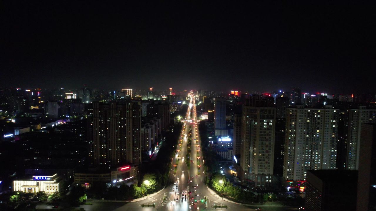 山东潍坊城市大道夜景交通车辆行驶航拍