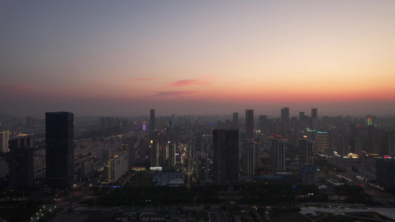 山东日照夕阳晚霞夜幕降临夜景灯光航拍 