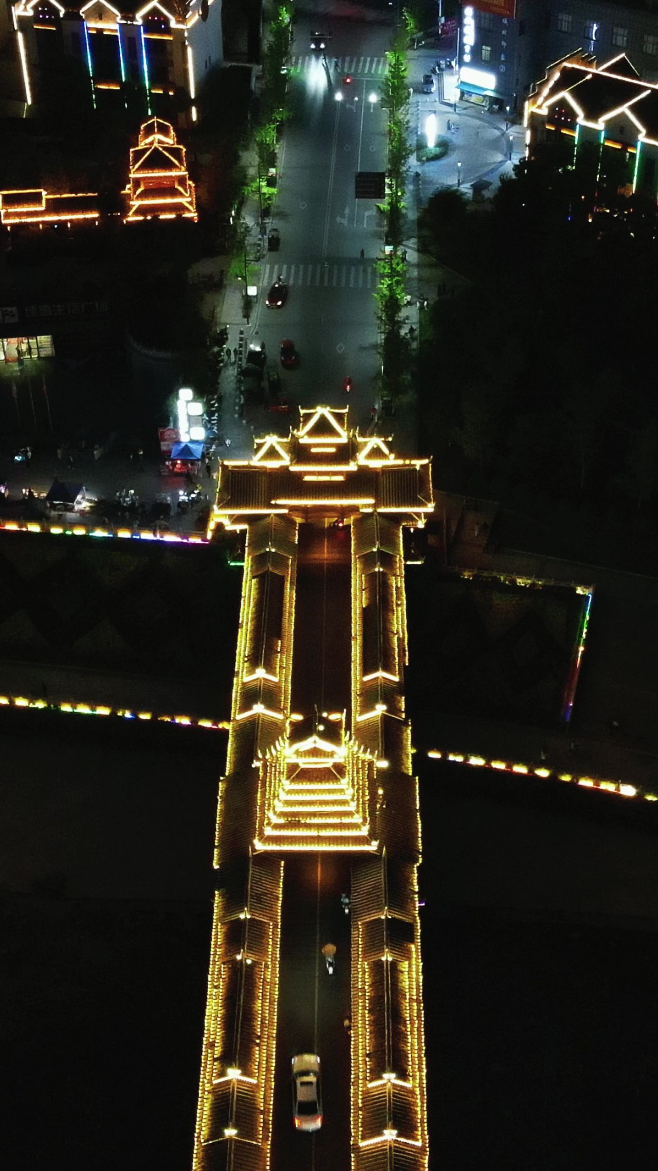 侗族特色建筑风雨桥鼓楼夜景竖屏