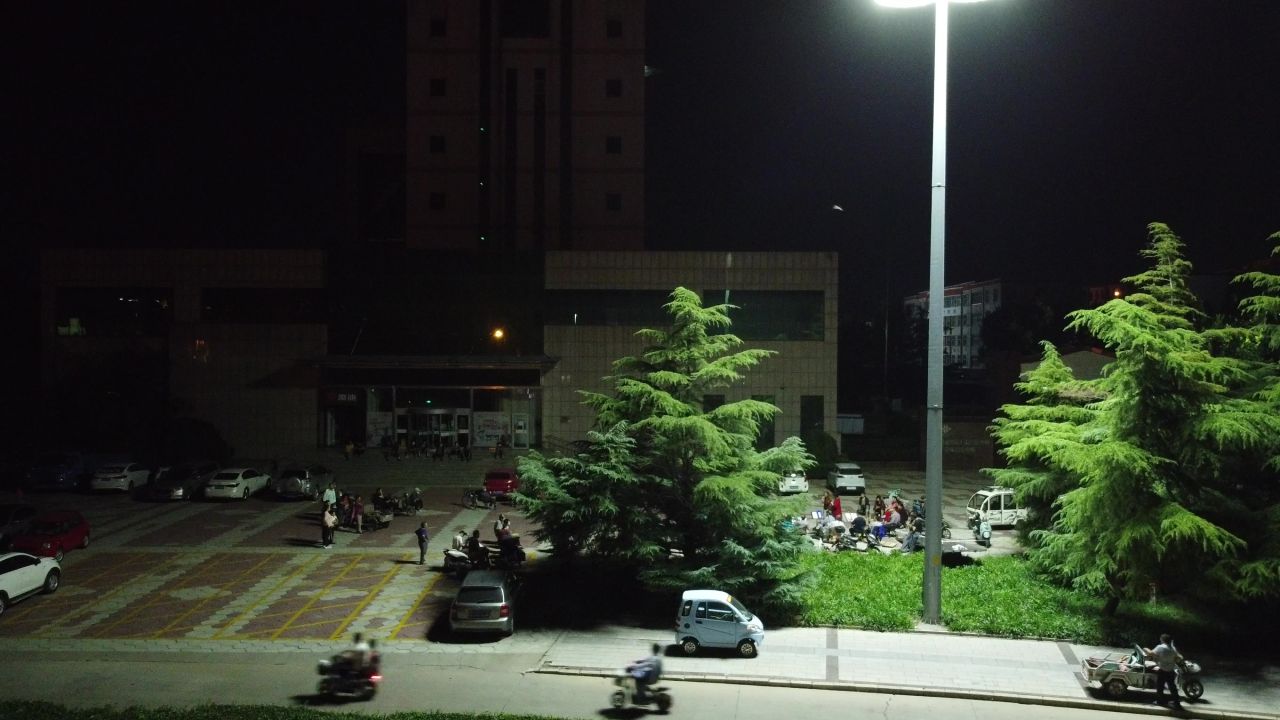 小城夏日夜晚乘凉航拍素材