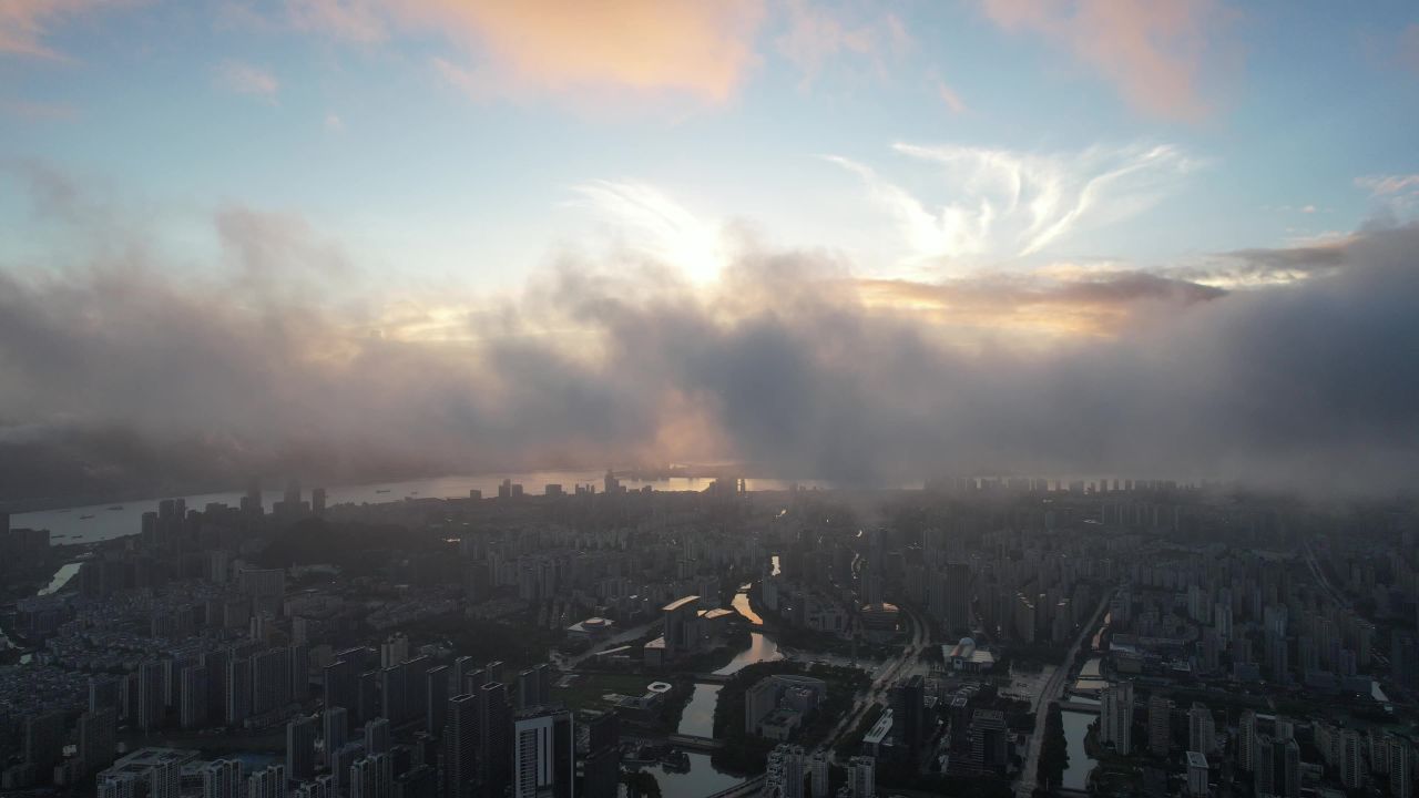  城市清晨云雾缭绕日出温州航拍