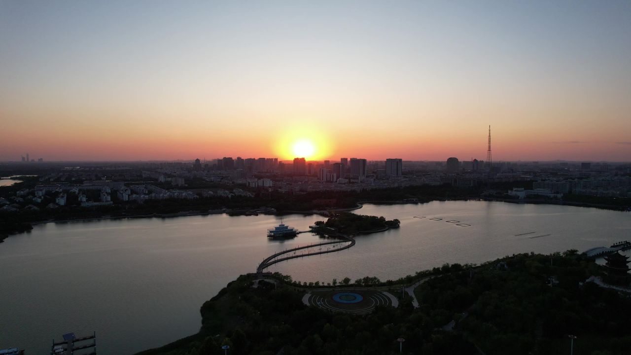 城市夕阳晚霞日落航拍东营日落  