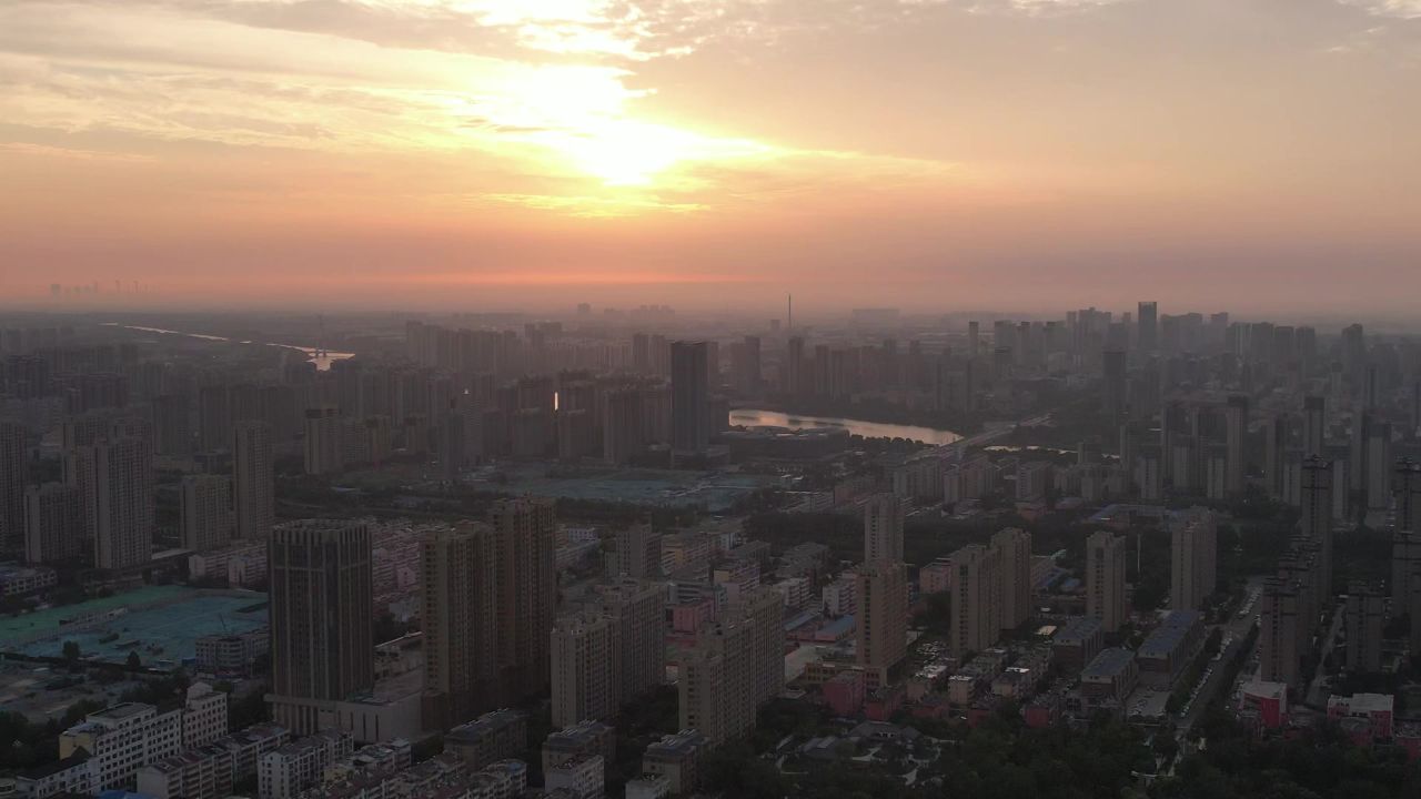 城市清晨日出彩霞航拍山东聊城  