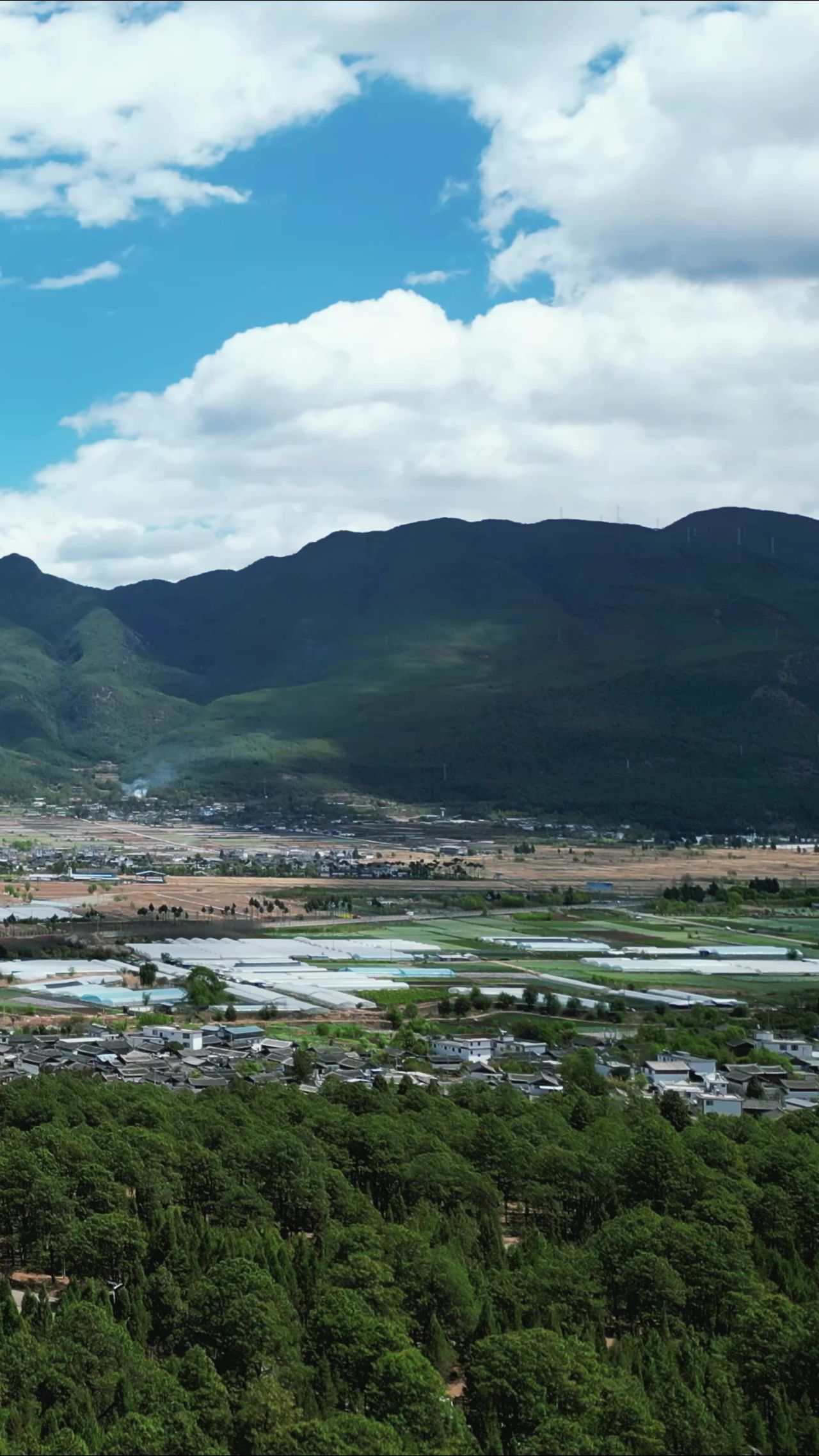 云南丽江城市风光竖屏航拍  