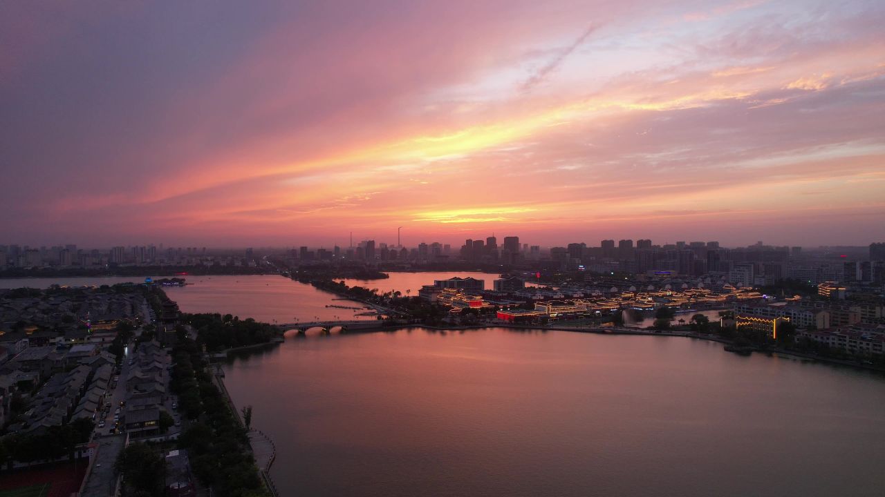 城市夕阳晚霞火烧云夜景降临山东聊城 