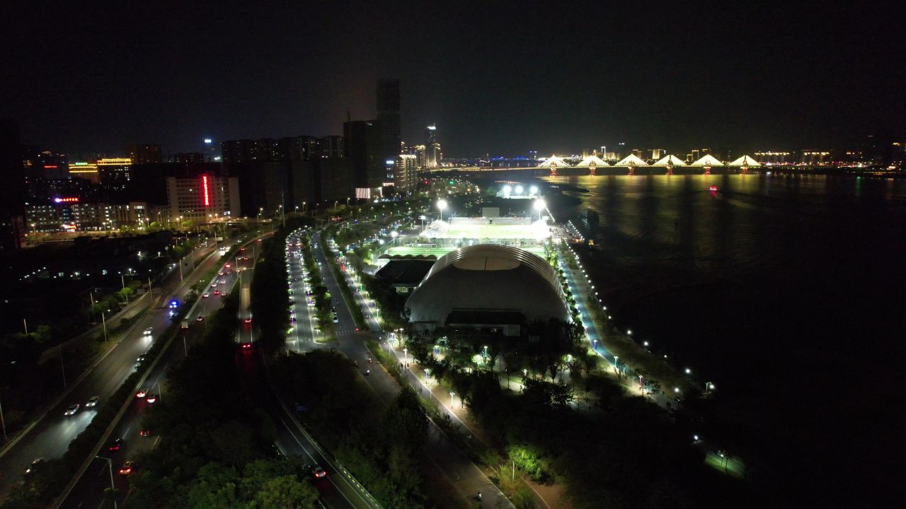 体育锻炼足球场夜晚踢足球比赛航拍 