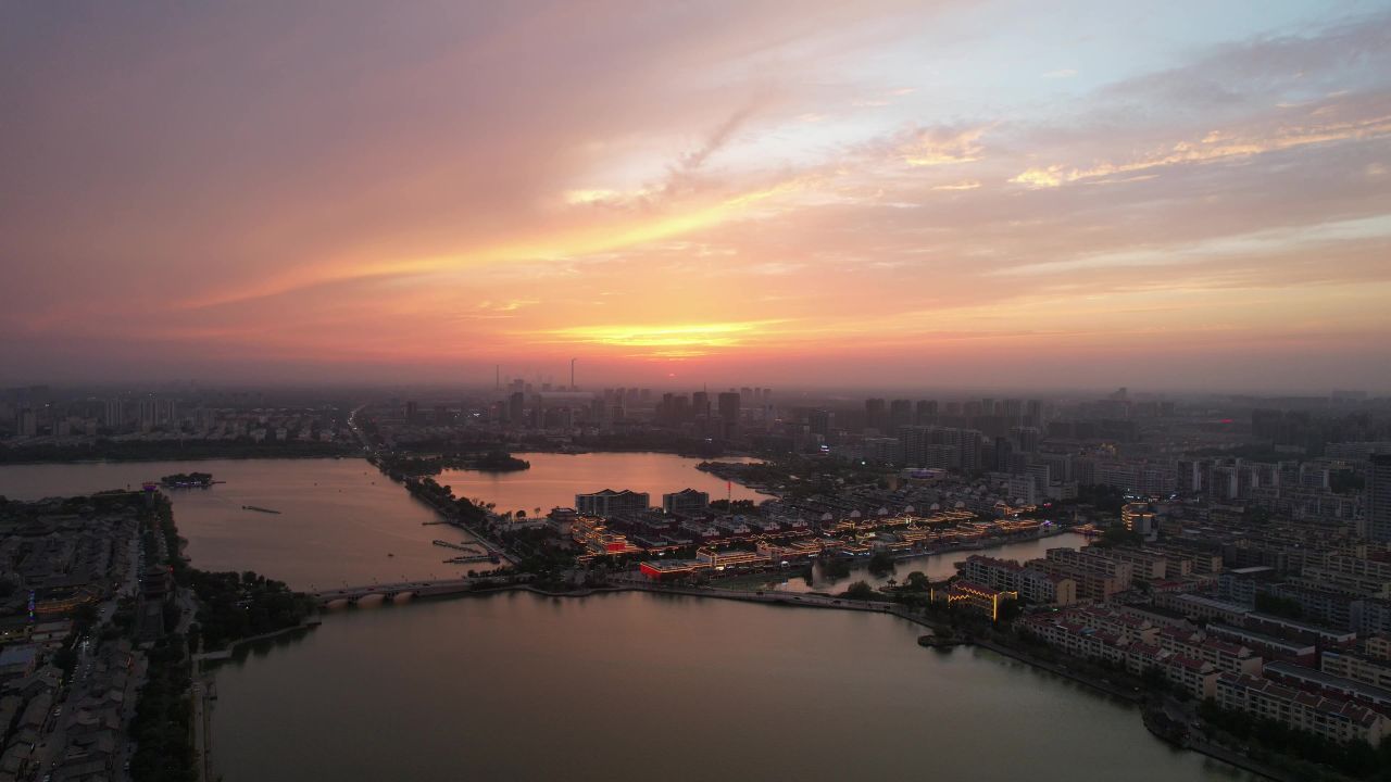 城市夕阳晚霞火烧云夜景降临山东聊城 