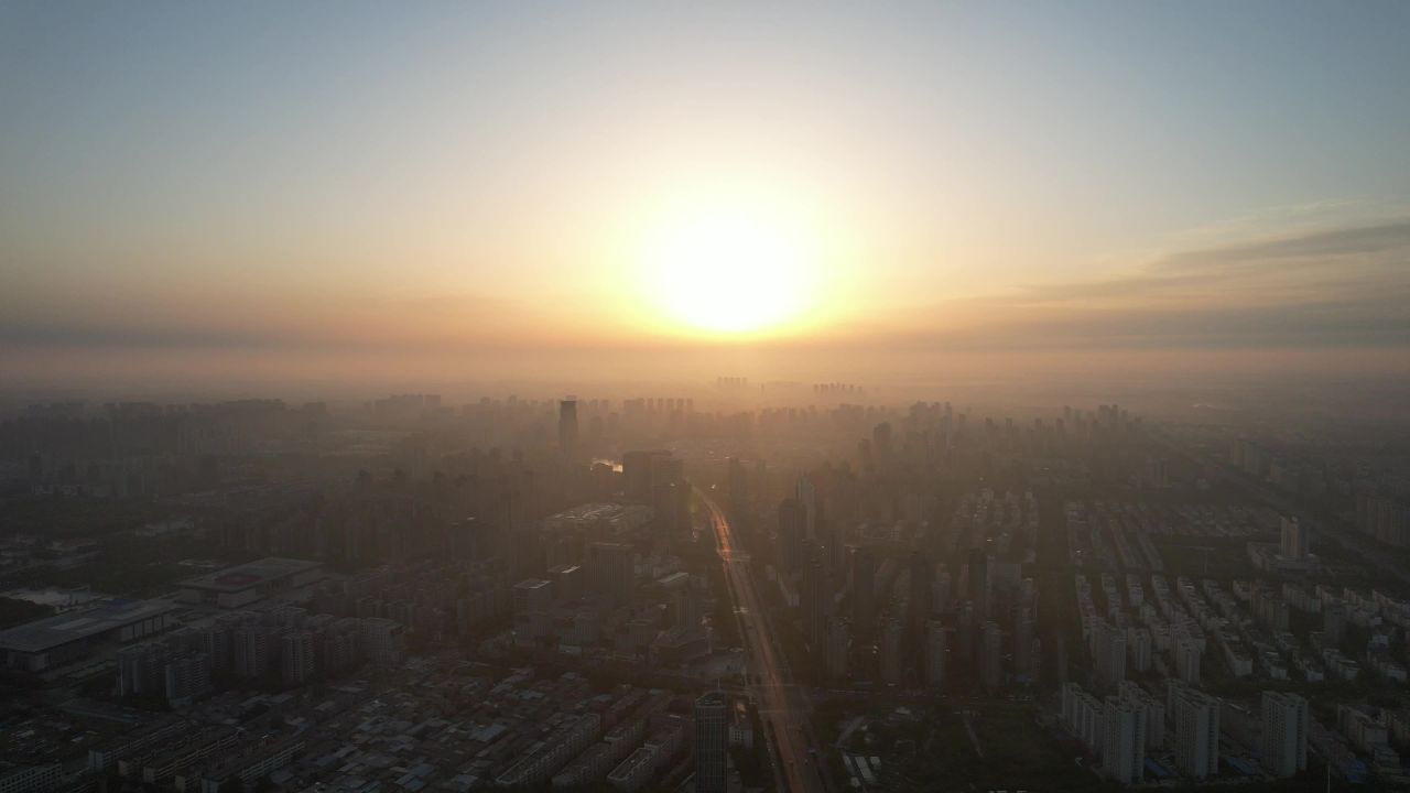 河南许昌城市日落迷雾航拍