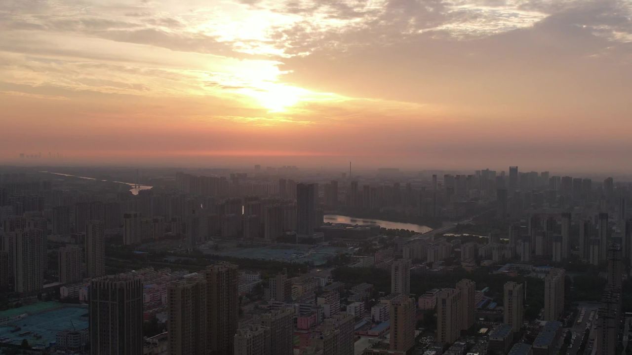 城市清晨日出彩霞航拍山东聊城  